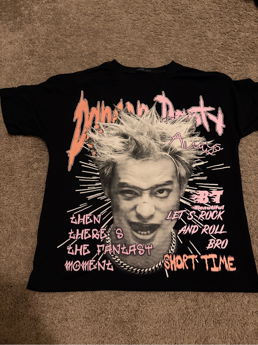 graphic tee of a person with spiky hair